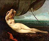 Nude reclining by the sea